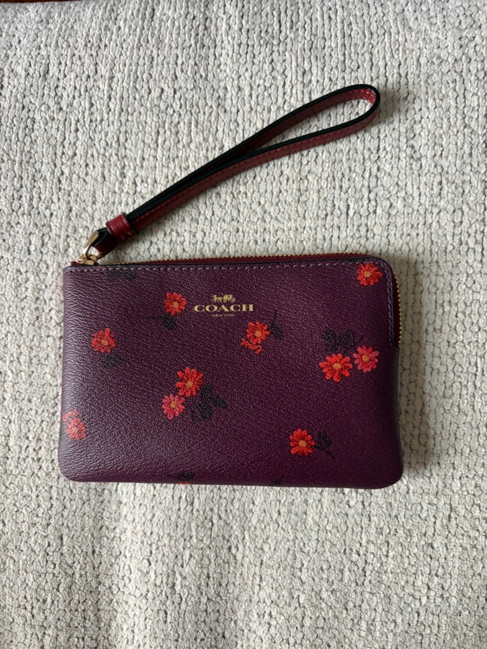 NWT COACH Plum Floral Leather Zip Wristlet